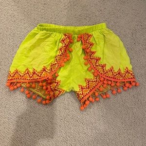 Neon yellow/green shorts with Pom poms